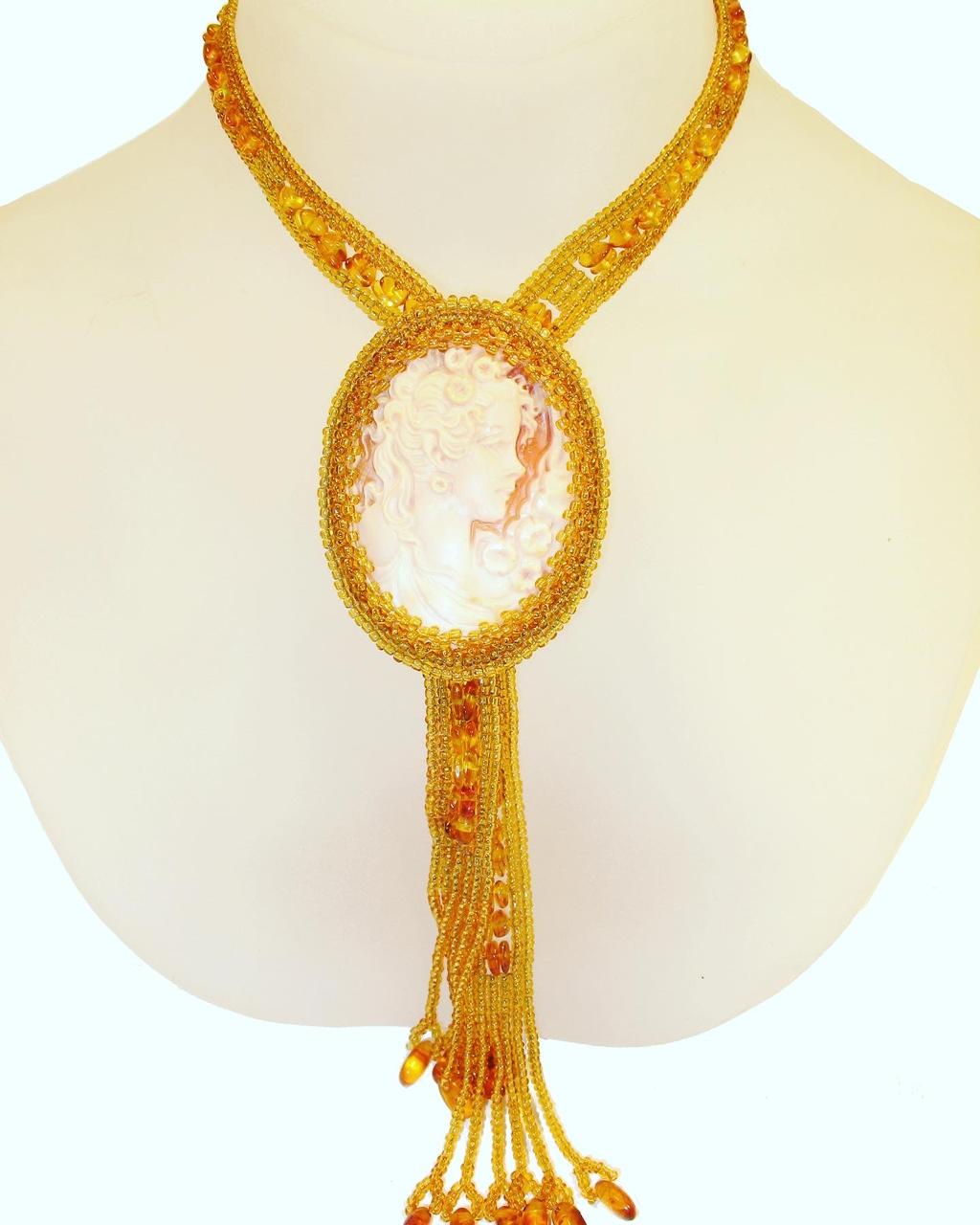 Amber necklace with a carved cameo